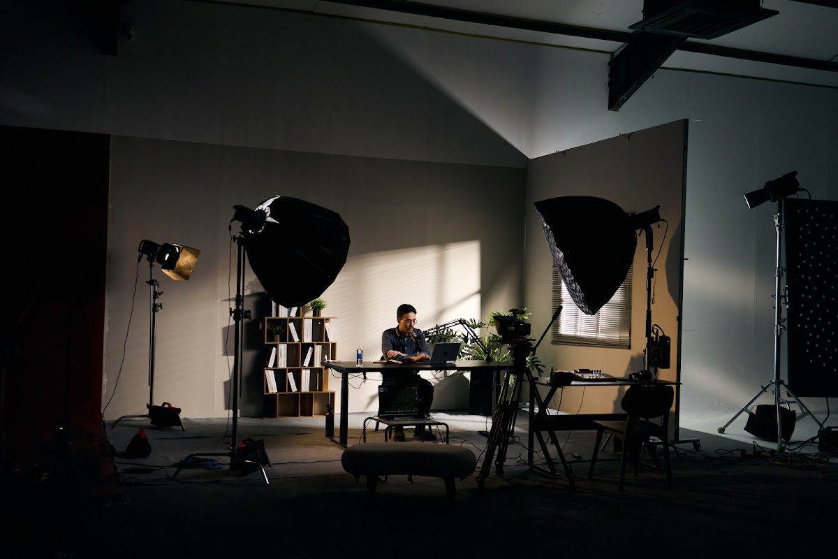 Controlled podcast set with soft lighting used for consistent recordings in Da Nang
