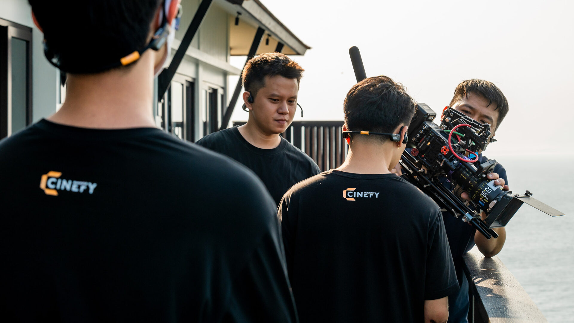 CINEFY DOP and camera operator lining up a shot on a TVC set in Da Nang