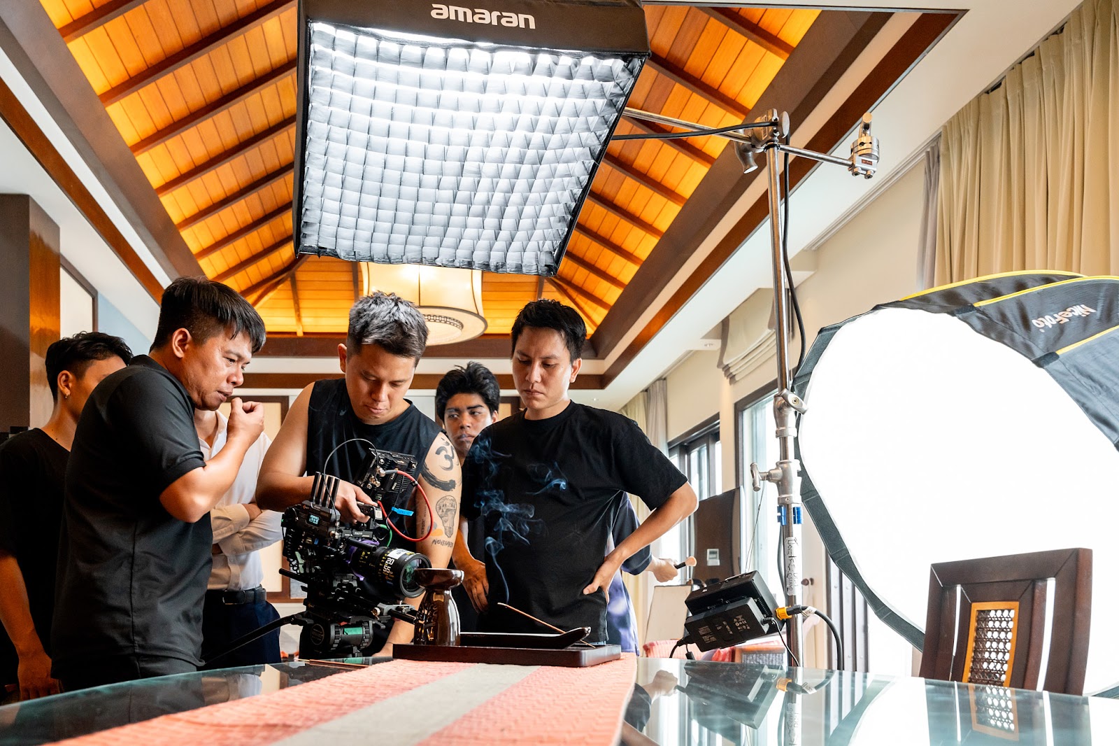 CINEFY technicians setting up cameras and lighting before an event in Da Nang