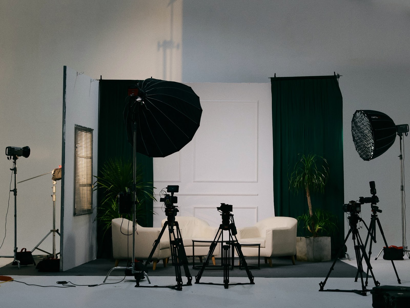 Green screen and backdrop studio setup with professional lighting rigs at CINEFY Studio Da Nang