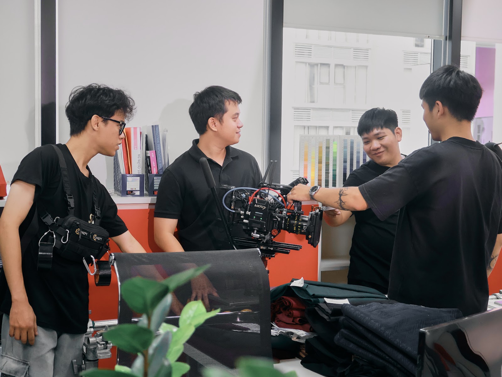 Client testing a rental camera before handover at the CINEFY studio in Da Nang.