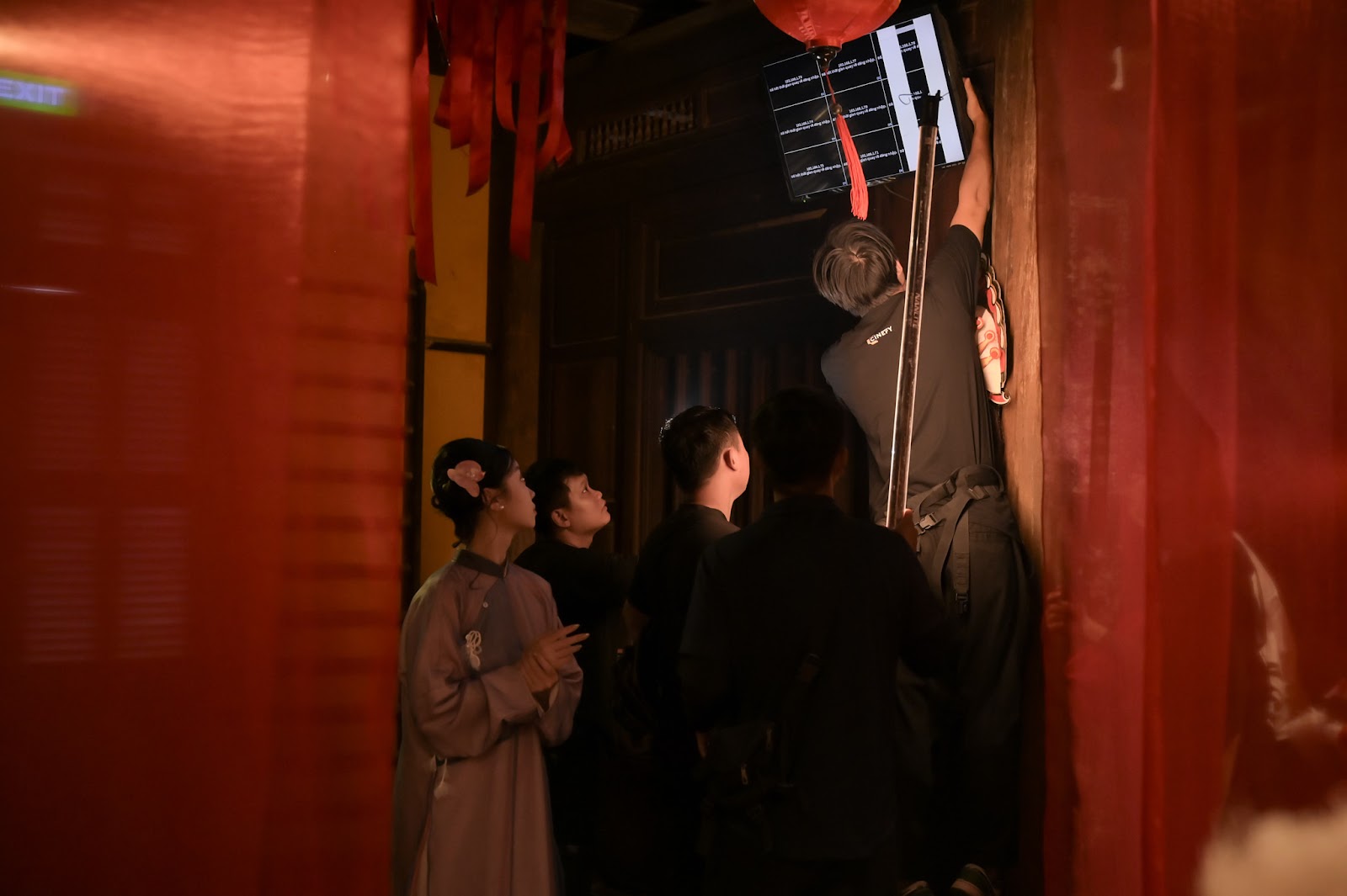 Music video set with red lanterns and large lighting rigs built by a video production company in Da Nang.