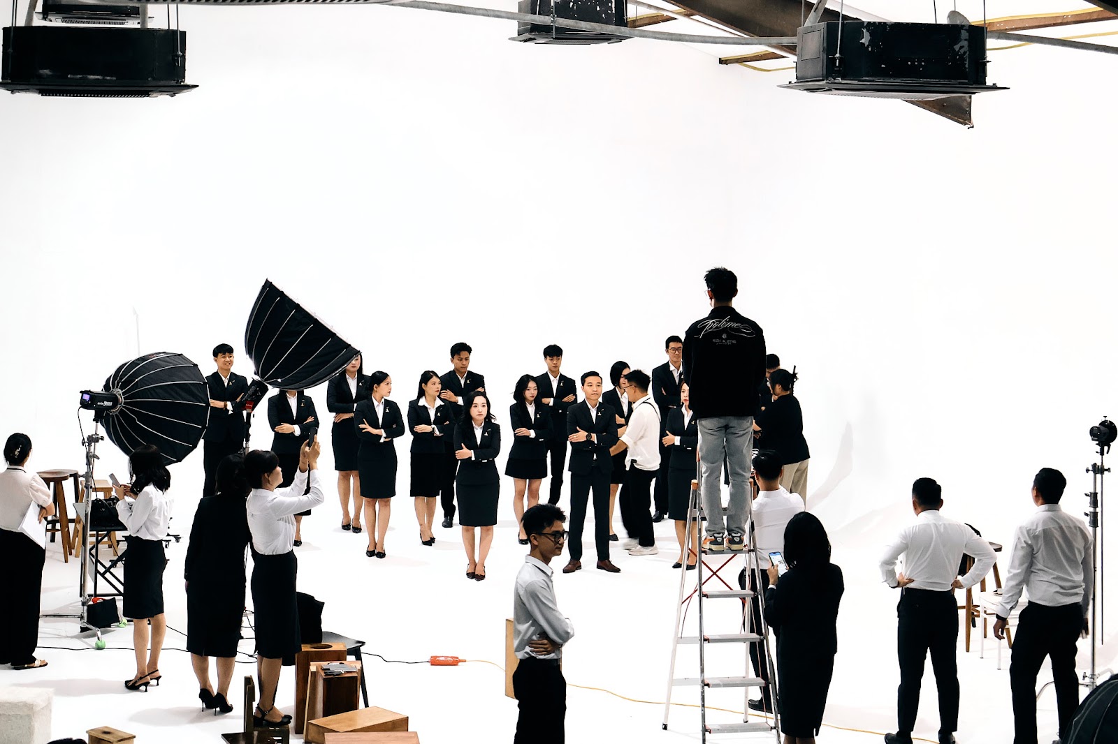 A large group shoot inside the CINEFY Da Nang studio showing the capacity of the 360 square metre space