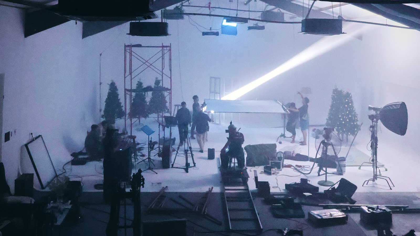 A hard beam cutting through haze during a shoot at the CINEFY studio in Da Nang