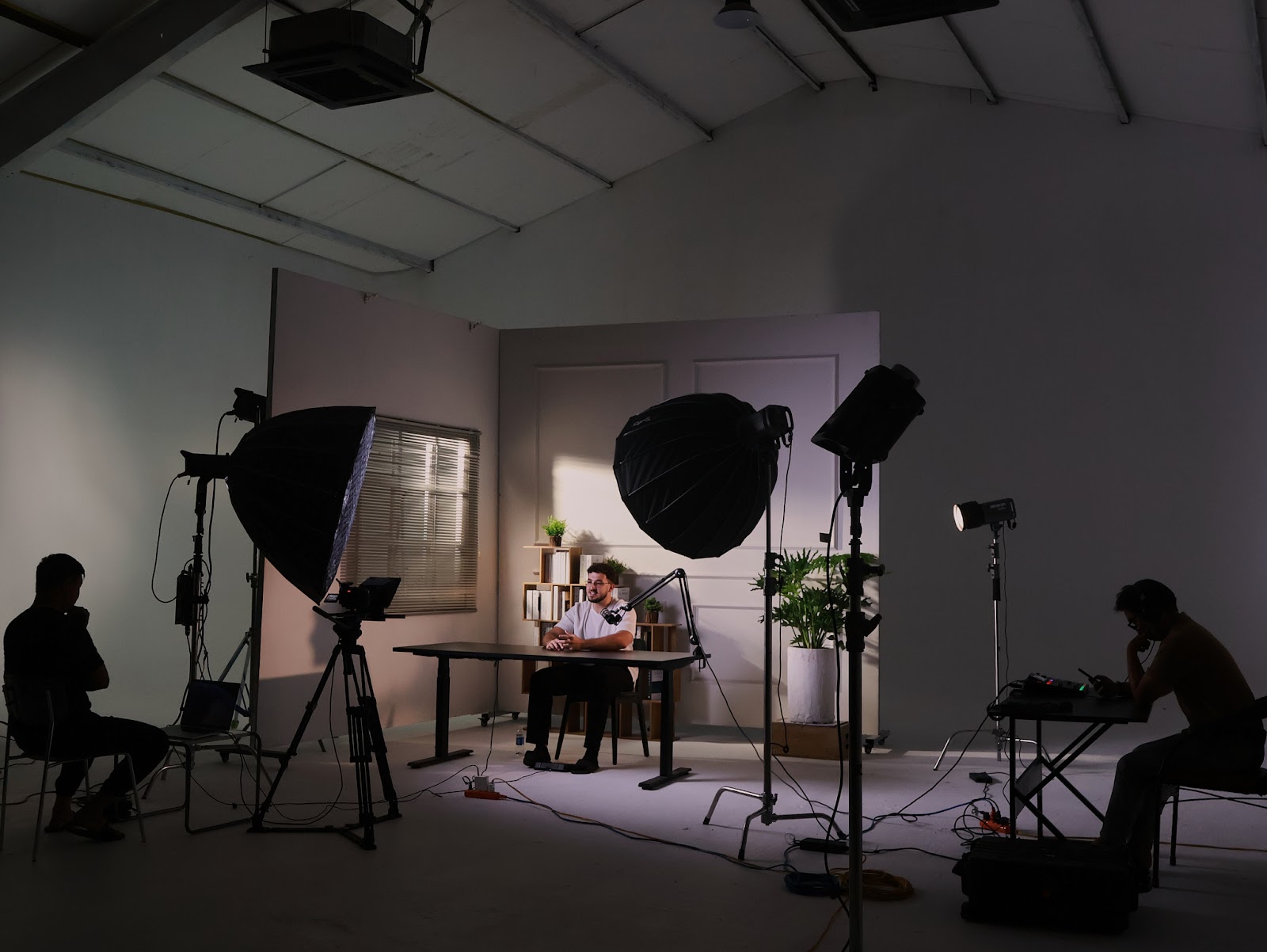 Multi camera crew running a podcast shoot inside the 360m2 CINEFY studio in Da Nang