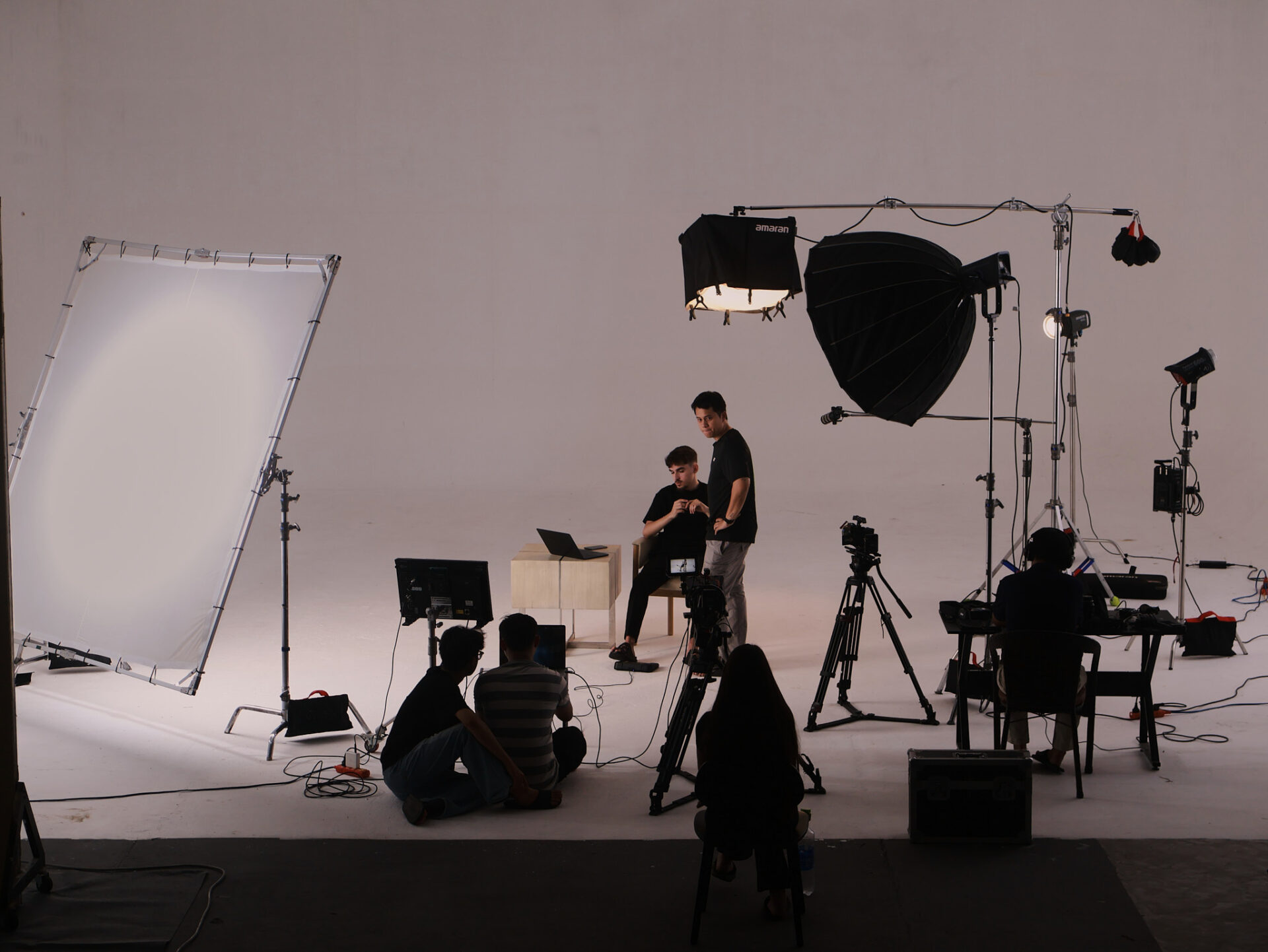 A CINEFY crew with cameras, lights and a sound cart during a shoot in the 360m2 studio in Da Nang
